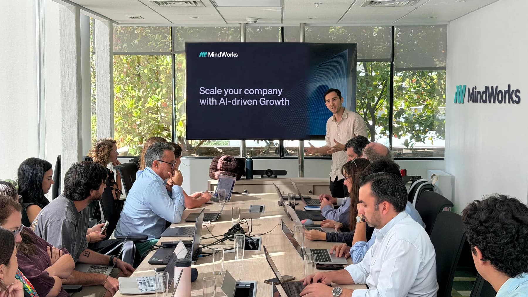 The MindWorks team during a presentation on AI-driven growth